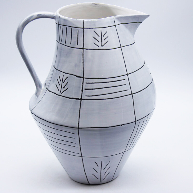 Vaso/brocca con incisioni