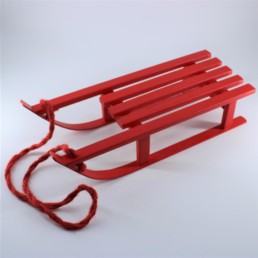 Slitta in legno rossa